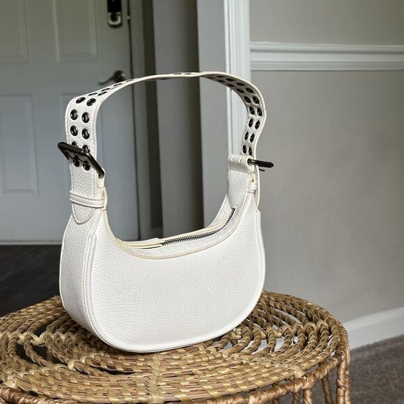 Urban Outfitters Handbags - Urban Outfitters Lucy Crescent Bag In White And Silver
